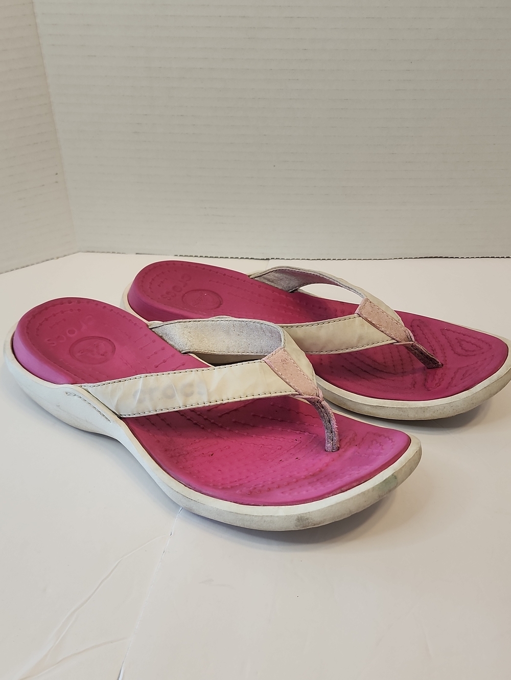 CROCS Size 9 Women’s Pink and White Comfort Flip Flops